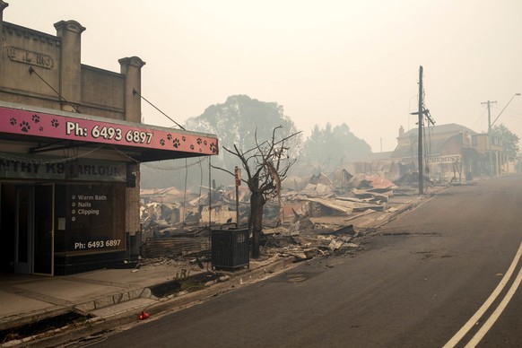 epaselect epa08096847 The rubble of buildings sits on the ground after they were destroyed by fire in Cobargo, New South Wales, Australia, 01 January 2020. EPA/SEAN DAVEY NO ARCHIVING AUSTRALIA AND NE ...