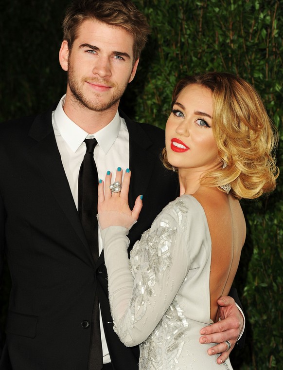 FILE - JANUARY 21: Miley Cyrus and Liam Hemsworth are reportedly engaged again after breaking up over two years ago. WEST HOLLYWOOD, CA - FEBRUARY 26: Actor Liam Hemsworth(L) and actress/singer Miley  ...