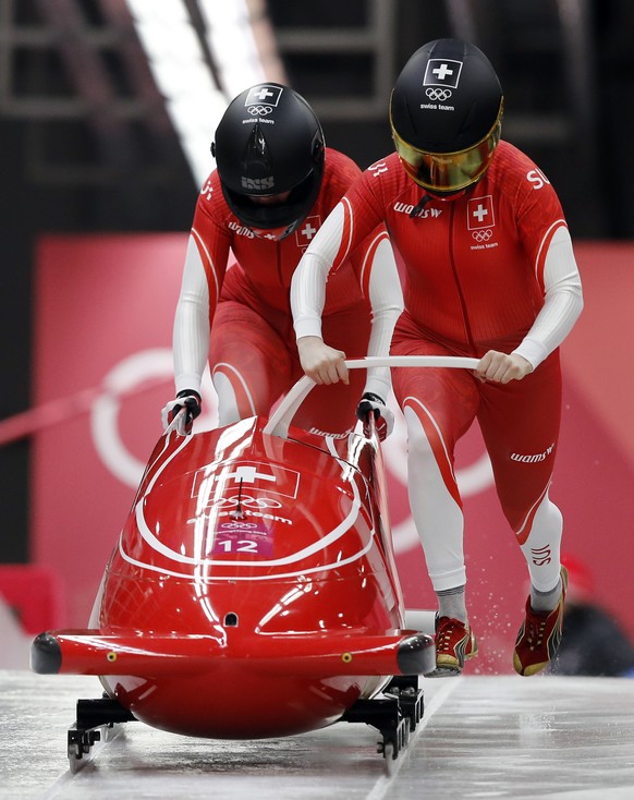 Driver Sabina Hafner and Rahel Rebsamen of Switzerland start their first heat during the women&#039;s two-man bobsled competition at the 2018 Winter Olympics in Pyeongchang, South Korea, Tuesday, Feb. ...