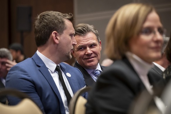 Alfred Gantner, homme d'affaire et patron de la societe dinvestissements Partners Group, au centre, lors de la celebration de l'election a la presidence du Conseil federal du president de l ...