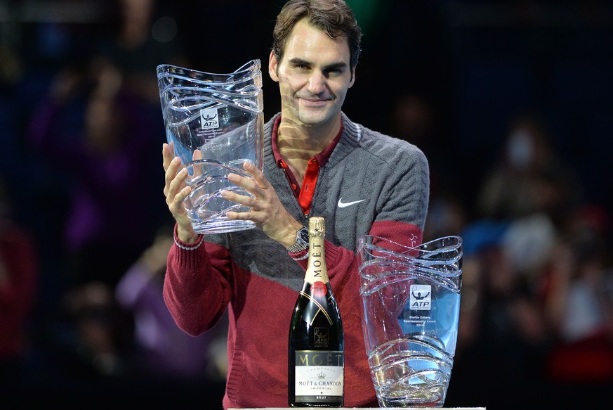 Roger Federer strahlt – Mirka darf sich auf zwei neue Vasen freuen.