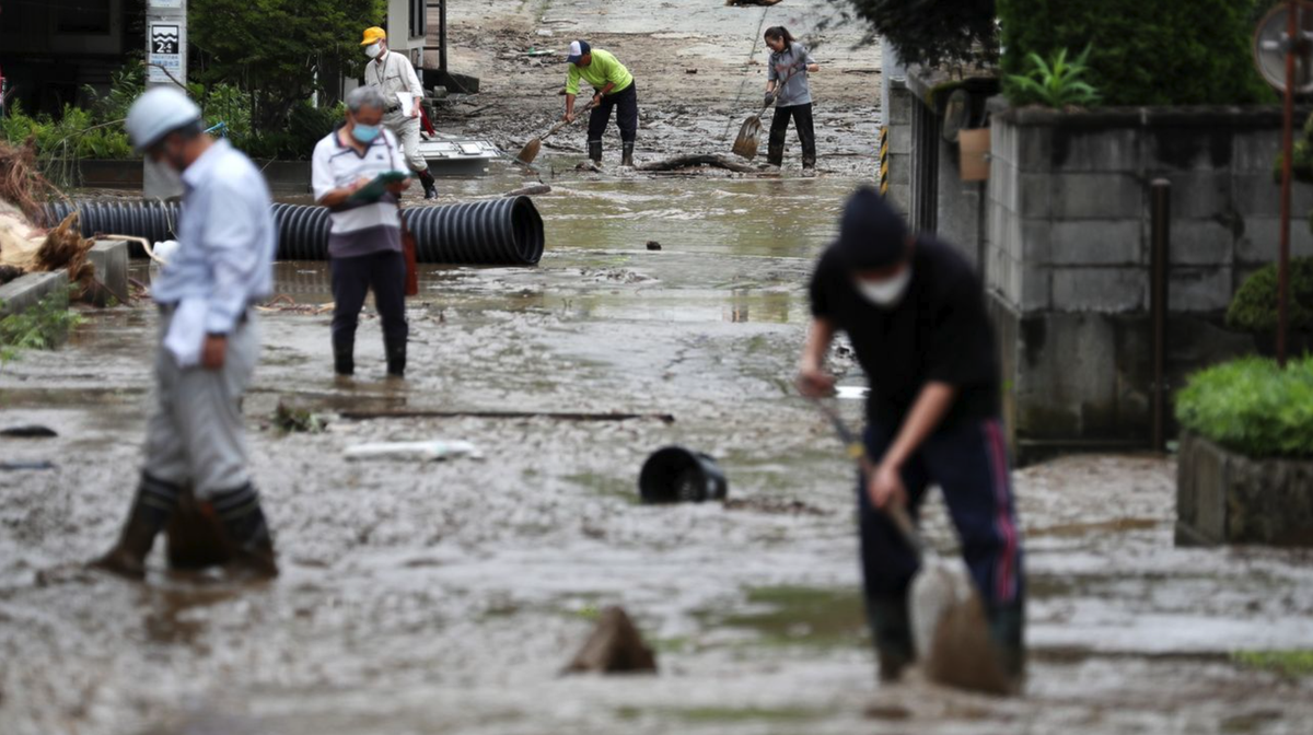 Rue inondée à Oe, dans la préfecture de Yamagata (nord-est du Japon), 04.08.2022.