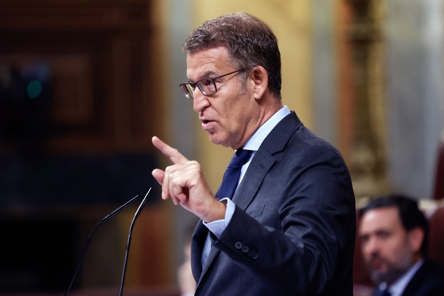 epa10885340 Leader of the People's Party Alberto Nunez-Feijoo intervenes in the parliamentary debate that will conclude with a first round of voting on his investiture, at the Lower Chamber in Ma ...