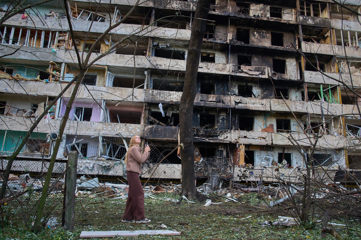 A young woman reacts as she looks at her damaged home after Russia's night missile attack in Kyiv, Ukraine, Wednesday, Oct. 14, 2026. (AP Photo/Efrem Lukatsky)
APTOPIX Russia Ukraine War