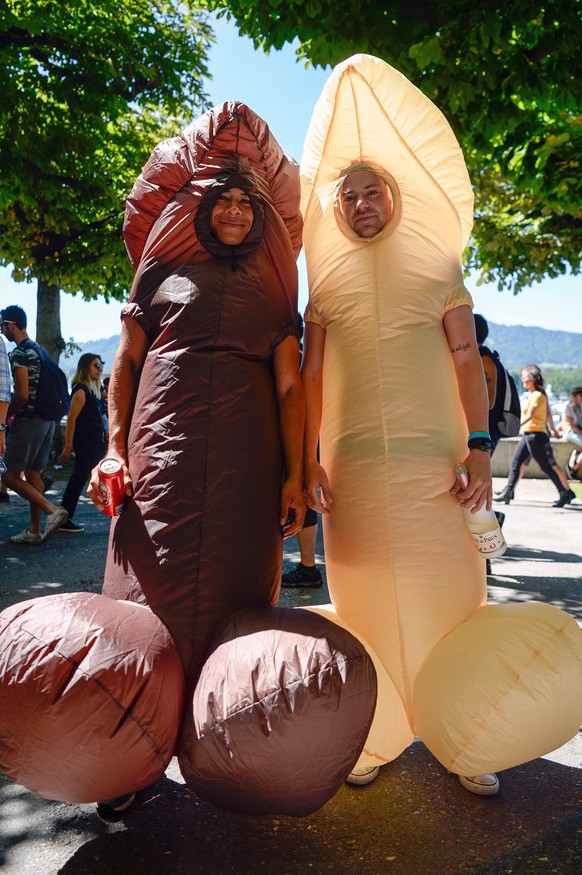 Fancy dressed participants of the annual technoparade "Street Parade" cheer in the city center of Zurich, Switzerland, Saturday, 13 August, 2016. (KEYSTONE/Walter Bieri)