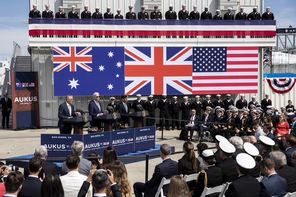 epaselect epa10521429 (L-R) Australian Prime Minister Anthony Albanese, US President Joe Biden and United Kingdom Prime Minister Rishi Sunak hold a press conference at the Naval Base Point Miramar in  ...