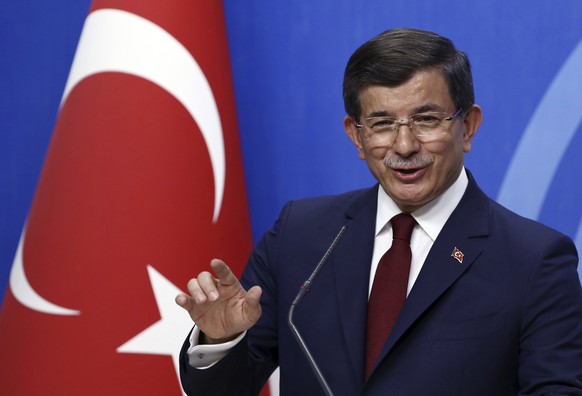 FILE - In this May 5, 2016 file photo, Prime Minister Ahmet Davutoglu speaks to the media, in Ankara, Turkey. Davutoglu, a former Turkish prime minister, who had served as foreign minister between 200 ...