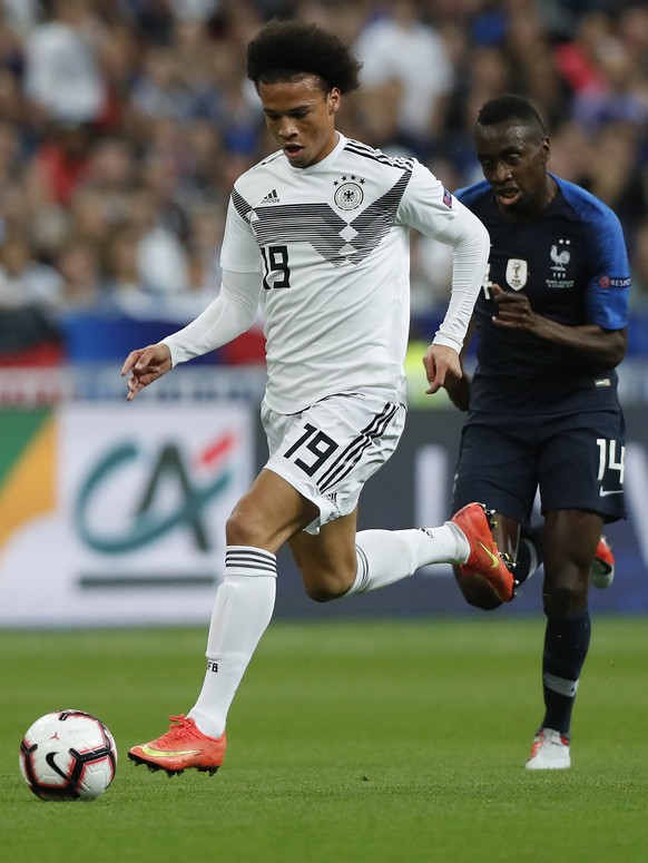 epa07098211 Germany&#039;s Leroy Sane (L) in action against France&#039;s midfielder Blaise Matuidi (R) during the UEFA Nations League match between France and Germany at Stade de France in Saint-Deni ...