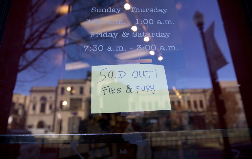 Sign posted at the door for Kramerbooks &amp; Afterwords Cafe indicating that the book &quot;Fire and Fury: Inside the Trump White House&quot; is sold out at the bookstore located in the Dupont Circle ...