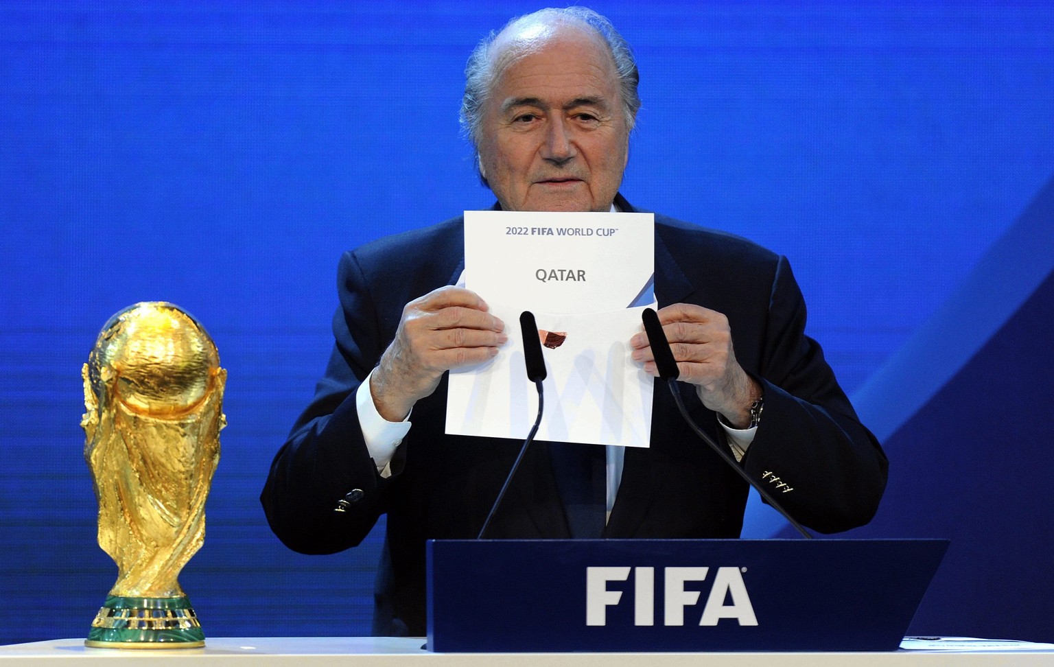 FILE - In this Thursday, Dec. 2, 2010 file photo FIFA President Sepp Blatter announces that Qatar will be hosting the 2022 Soccer World Cup,, during the FIFA 2018 and 2022 World Cup Bid Announcement i ...