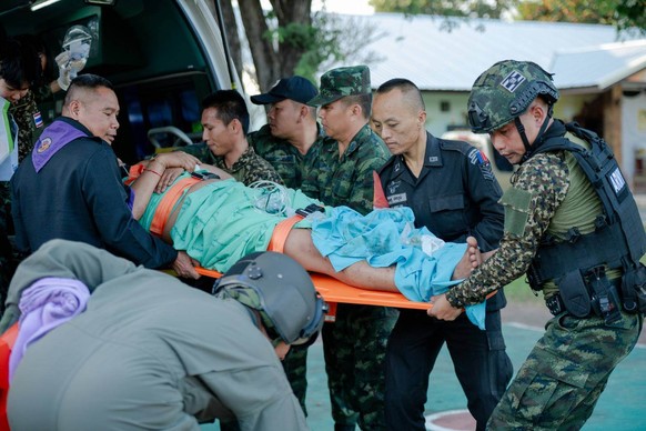 In this photo released by Royal Thai Army, a wounded Thai soldier is carried to be transferred to a hospital in Sisaket province, Thailand, Sunday, Dec. 7, 2025, after, according to a Thai army spokes ...
