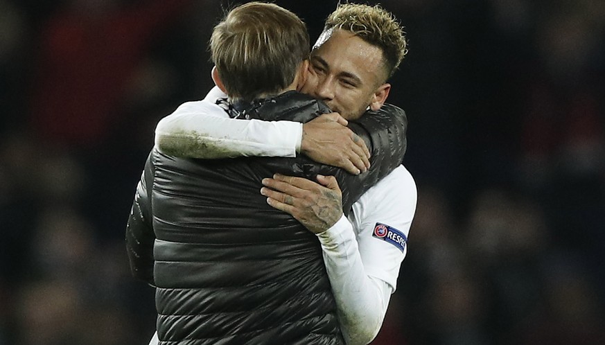 epa07196354 Paris Saint Germain head coach Thomas Tuchel (L) and Neymar (R) celebrate after the UEFA Champions League Group C soccer match between Paris Saint Germain and Liverpool at the Parc des Pri ...