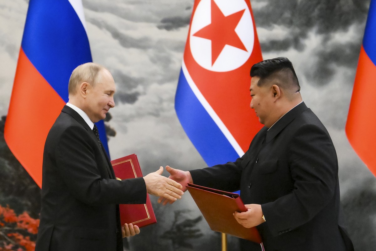 FILE - Russian President Vladimir Putin, left, and North Korea's leader Kim Jong Un exchange documents during a signing ceremony of the new partnership in Pyongyang, North Korea, on June 19, 2024 ...