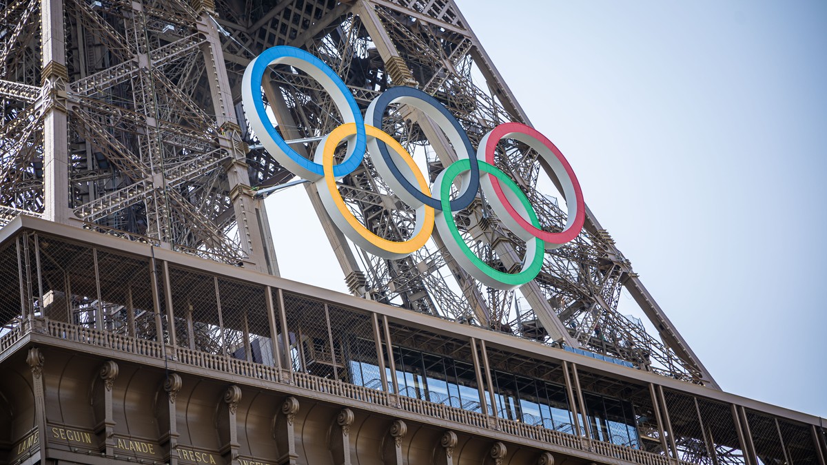 epa11487636 The Eiffel Tower is decorated with the Olympic Rings in Paris, France, 19 July 2024. From 18 to 26 July, the day of the Opening Ceremony of the Paris 2024 Olympic Games, security measures  ...