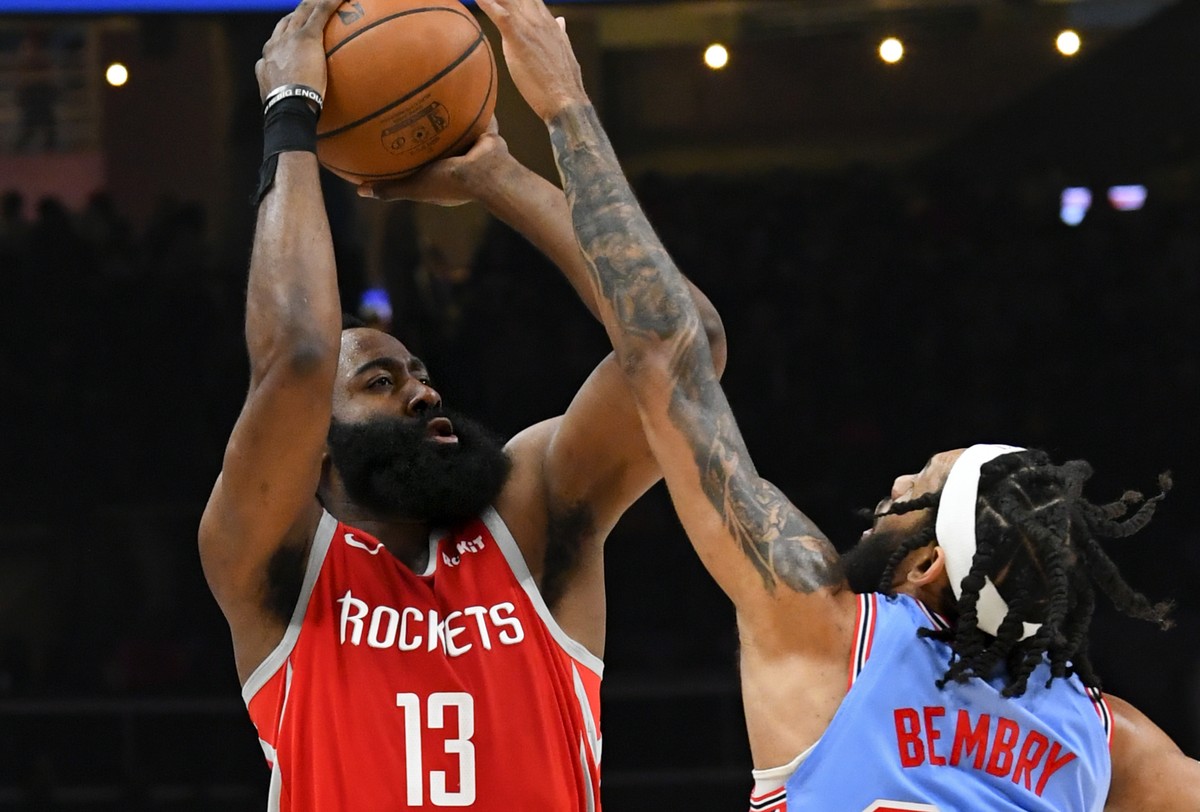 Houston Rockets guard James Harden (13) shoots as Atlanta Hawks forward DeAndre' Bembry defends during the second half of an NBA basketball game Tuesday, March 19, 2019, in Atlanta. Houston won 1 ...