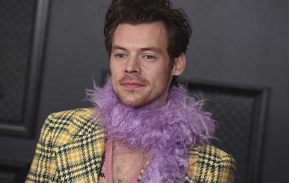Harry Styles poses in the press room at the 63rd annual Grammy Awards at the Los Angeles Convention Center on Sunday, March 14, 2021. (Photo by Jordan Strauss/Invision/AP)
Harry Styles
