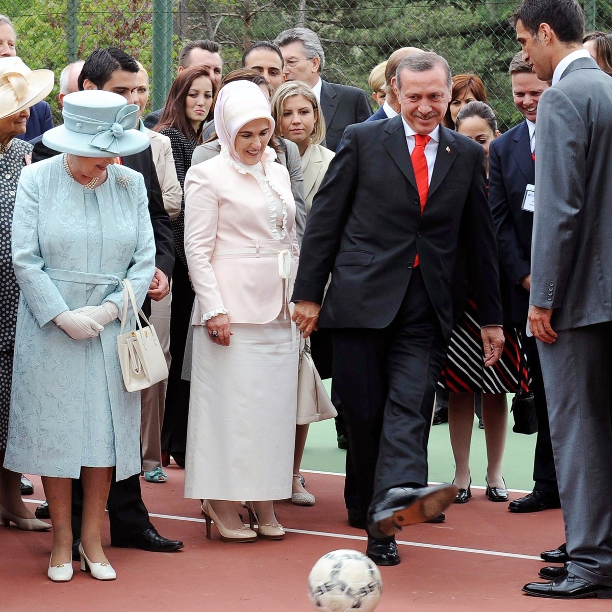 FILE - In this Friday, May 16, 2008, file photo Britain's Queen Elizabeth II, left, with Turkish Prime Minister Tayyip Erdogan, 2nd right, and his wife Emine Erdogan, second left, and Turkish soc ...
