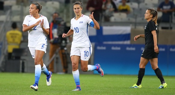 United States&#039; Carli Lloyd, center, celebrates after scoring against New Zealand during a Women&#039;s Olympic Football Tournament match at the Mineirao stadium in Belo Horizonte, Brazil, Wednesd ...