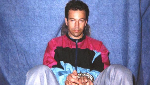 FILE - This file photo obtained on Jan. 30, 2002, shows Wall Street Journal reporter Daniel Pearl in captivity by Pakistani militants. A videotape received by U.S. diplomats in February 2002 confirmed ...