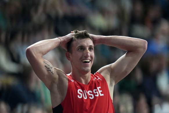 Simon Ehammer, of Switzerland, reacts after winning the gold medal in the Heptathlon during the World Athletics Indoor Championships at the Emirates Arena in Glasgow, Scotland, Sunday, March 3, 2024.  ...