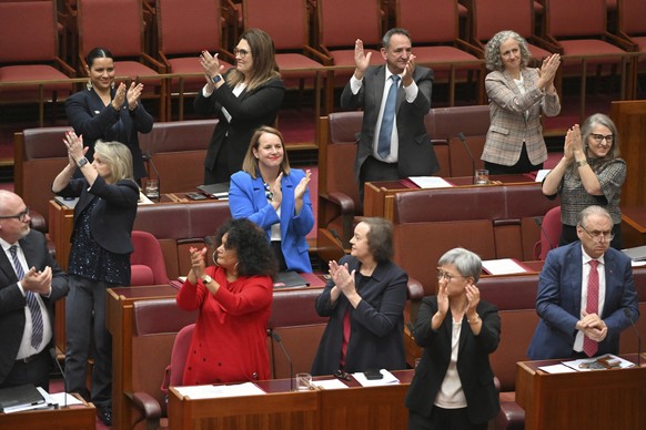 Labor senators applaud after the passing of the Voice to Parliament in the Senate chamber at Australia&#039;s Parliament House, in Canberra, Monday, June 19, 2023. The Senate voted to hold a referendu ...