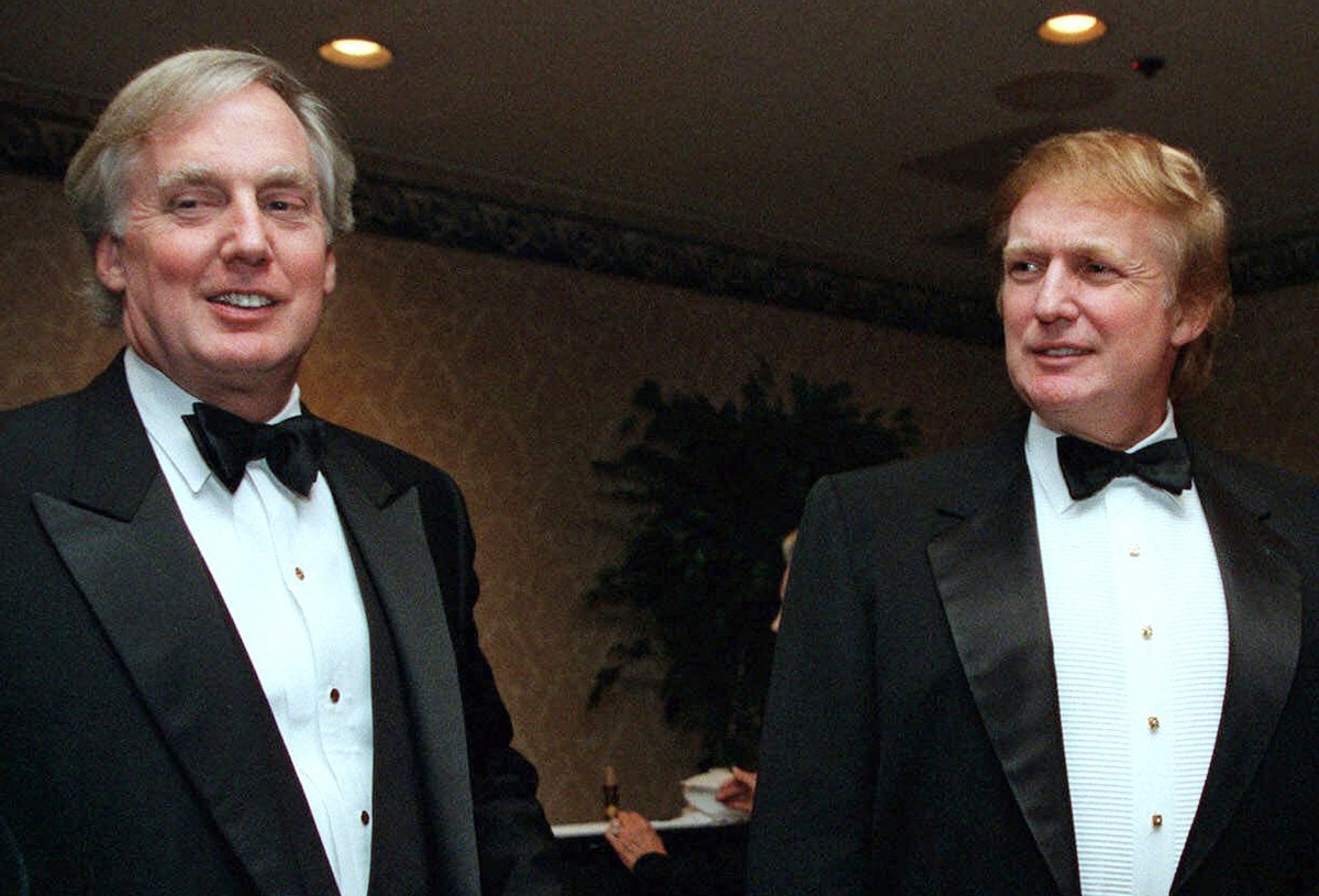 FILE - In this Nov. 3, 1999, file photo, Robert Trump, left, joins then real estate developer and presidential hopeful Donald Trump at an event in New York. President Donald Trump's younger broth ...