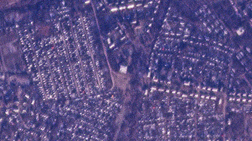 This satellite image from Planet Labs PBC shows a vocational school in the Russian-occupied town of Makiivka, Ukraine, December 2014. January 20, 2022. Satellite images analyzed by The Associated Press on Tuesday, January 1…