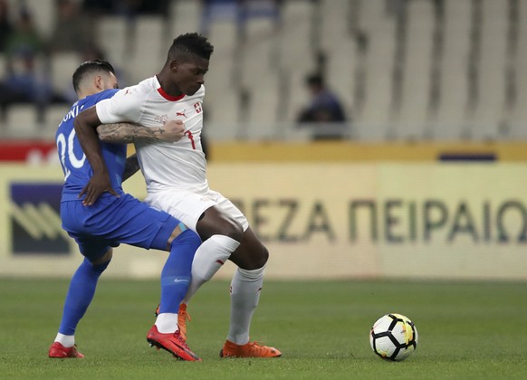 Switzerland&#039;s Breel Embolo, right, duels for the ball with Greece&#039;s Tasos Donis during an international friendly soccer match between Greece and Switzerland at the Olympic stadium in Athens, ...