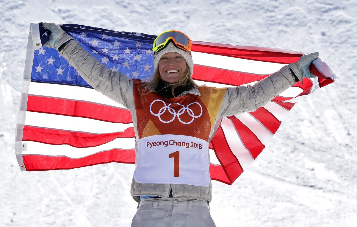 Jamie Anderson, of the United States, celebrates winning gold after the women's slopestyle final at Phoenix Snow Park at the 2018 Winter Olympics in Pyeongchang, South Korea, Monday, Feb. 12, 201 ...