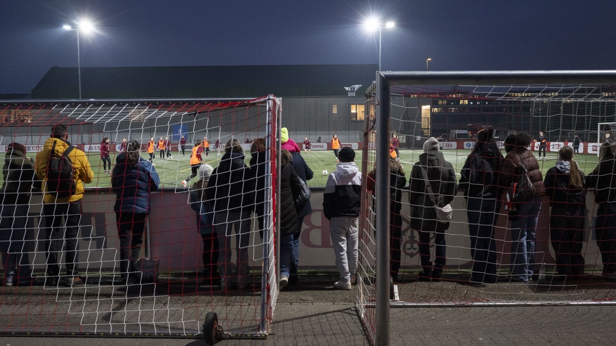 People follow the training session of the Swiss national team before the UEFA Women's Nations League match against Iceland on Friday at the Gruenfeld sports facility in Rapperswil-Jona, Switzerla ...