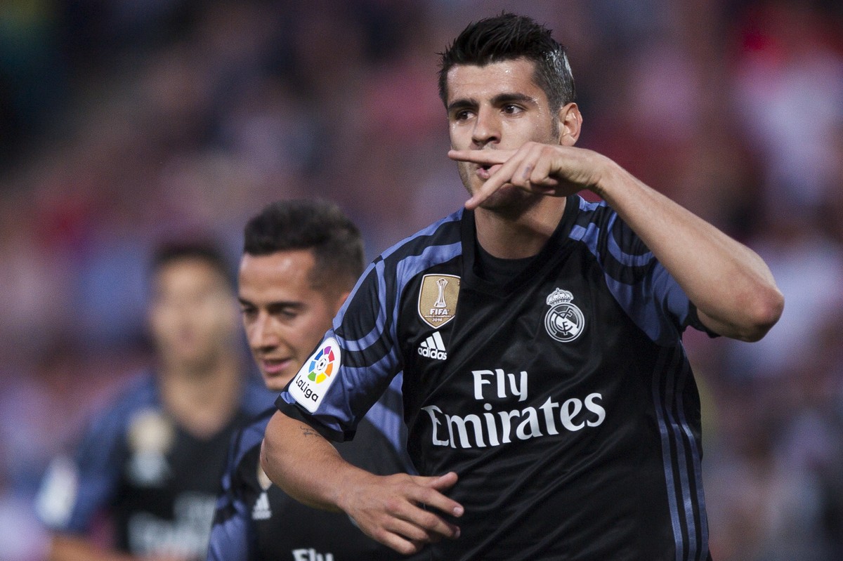 Real Madrid's Alvaro Morata celebrates scoring his goal against Granada during a Spanish La Liga soccer match between Granada and Real Madrid in Granada, Spain, Saturday May 6, 2017. (AP Photo/Da ...