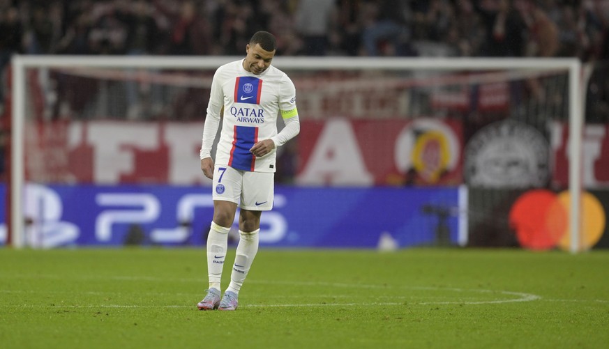 PSG&#039;s Kylian Mbappe walks at the end of the Champions League round of 16 second leg soccer match between Bayern Munich and Paris Saint Germain at the Allianz Arena in Munich, Germany, Wednesday,  ...