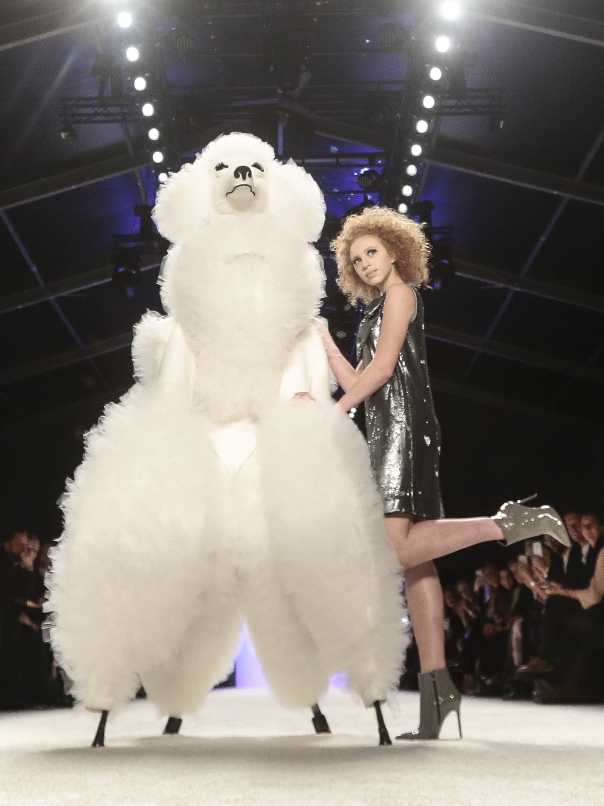 Model Anna Ermakova, daughter of German former Tennis star Boris Becker, wears a creation for Riani's Fall /Winter 2015-2016 collection, as part of Fashion Week in Berlin, Tuesday, Jan. 20, 2015. ...