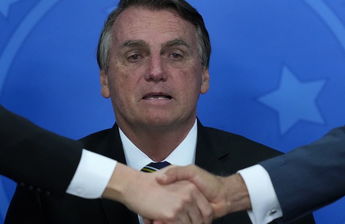 Brazil's President Jair Bolsonaro attends a ceremony at the Planalto presidential palace, in Brasilia, Brazil, Wednesday, Oct. 20, 2021. A Senate report recommended Wednesday pursuing crimes agai ...