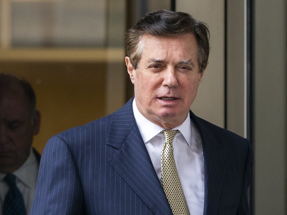 epa06679937 Paul Manafort, former campaign manager for US President Donald J. Trump, leaves the DC federal courthouse after asking the court to dismiss charges brought by special counsel Robert Muelle ...