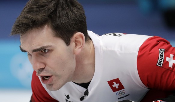 Switzerland&#039;s skip Peter de Cruz shouts instructions during their men&#039;s curling match against Britain at the 2018 Winter Olympics in Gangneung, South Korea, Wednesday, Feb. 21, 2018. Switzer ...