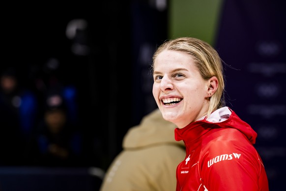 Debora Annen of Switzerland reacts in the finish area during the women's monobob bobsled heat 4 at the 2026 Olympic Winter Games in Cortina d'Ampezzo, Italy, on Monday, February 16, 2026. (K ...