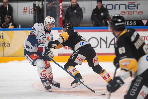 From left, Harrison Luc Schreiber (ZSC), Santeri Alatalo (HCL) and Carl Dahlstroem (HCL), during Game 4 of the National League play-off match between HC Lugano and ZSC Lions at the Corner Arena in Lug ...
