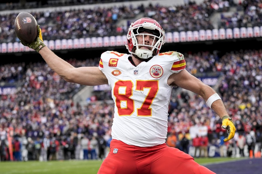 Kansas City Chiefs tight end Travis Kelce (87) celebrates his touchdown against the Baltimore Ravens during the first half of an AFC Championship NFL football game, Sunday, Jan. 28, 2024, in Baltimore ...