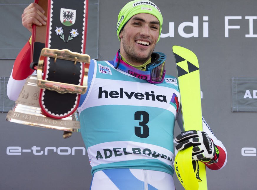 epa08122402 Daniel Yule of Switzerland celebrates on the podium after winning the Men&#039;s Slalom race at the FIS Alpine Skiing World Cup in Adelboden, Switzerland, 12 January 2020. EPA/PETER KLAUNZ ...