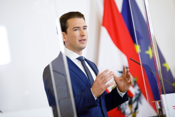 epa08789066 Austrian Chancellor Sebastian Kurz speaks during a press conference at the Austrian Chancellery in Vienna, Austria, 31 October 2020. Austrian government introduces further strict measures  ...