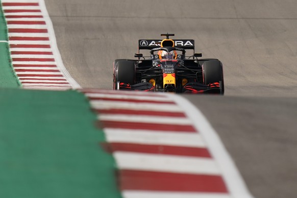 Red Bull driver Max Verstappen, of the Netherlands, steers into a turn during the qualifying session for the Formula One U.S. Grand Prix auto race at the Circuit of the Americas, Saturday, Oct. 23, 2021, in Austin, Texas. (AP Photo/Eric Gay)
Max Verstappen