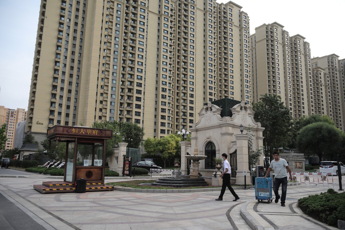 epa09467223 A view shows an Evergrande housing complex in Beijing, China, 14 September 2021. Chinese property developer Evergrande said on 14 September that its property sales will likely continue to  ...