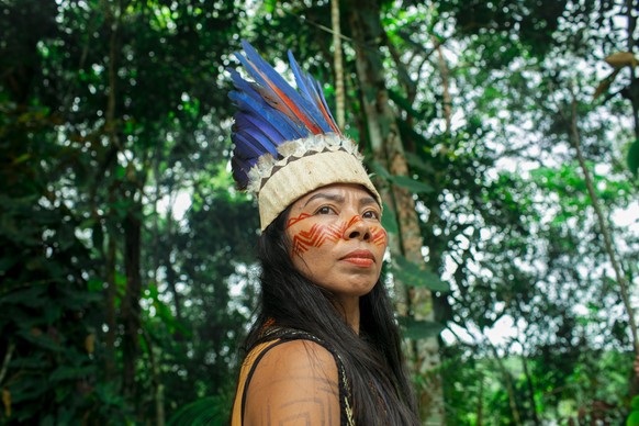 In this May 31, 2022, photo provided by Danila Bustamante, Vanda Witoto, who is running for Congress in Amazonas state, poses for a photo in Manaus, Brazil. Like other Brazilians, residents of the Ama ...