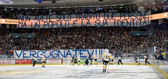 KEYPIX - Ambri fans express their opinion during the regular season National League game between HC Ambri Piotta and HC Ajoie at the ice stadium Gottardo Arena, Switzerland, October 10, 2025. (KEYSTON ...