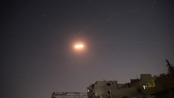 epa09421212 Syrian air defense intercepts missiles over Damascus, Syria, August 19, 2021. According to official Syrian media sources, the Syrian air defense intercepted missiles allegedly fired from Israel ...