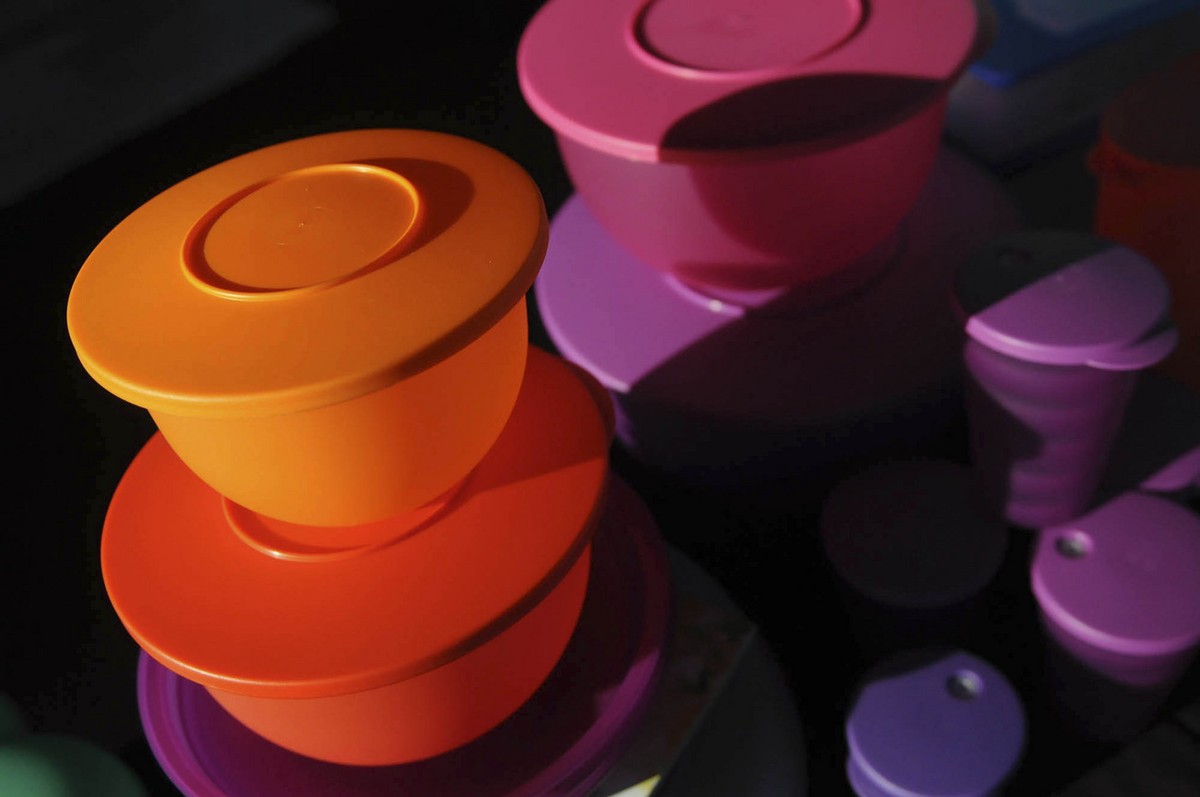 This Friday, Aug. 5, 2011 photo shows some of Kevin Farrell&amp;#039;s colorful Tupperware products at a Tupperware party in Bellflower, Calif. Tupperware, it seems, is enjoying a renaissance 65 years ...