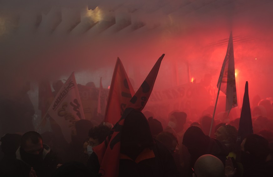 Striking railway workers invade French luxury group LVMH&#039;s headquarters, Thursday, April 13, 2023 in Paris. Protesters opposed to President Emmanuel Macron&#039;s unpopular plan to raise the reti ...