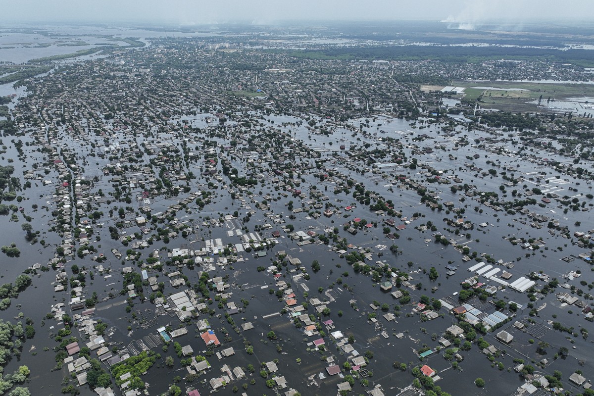 Houses are seen underwater in the flooded town of Oleshky, Ukraine, Saturday, June 10, 2023. Extensive flooding from the catastrophic destruction of the Kakhovka Dam on June 6 devastated towns along t ...