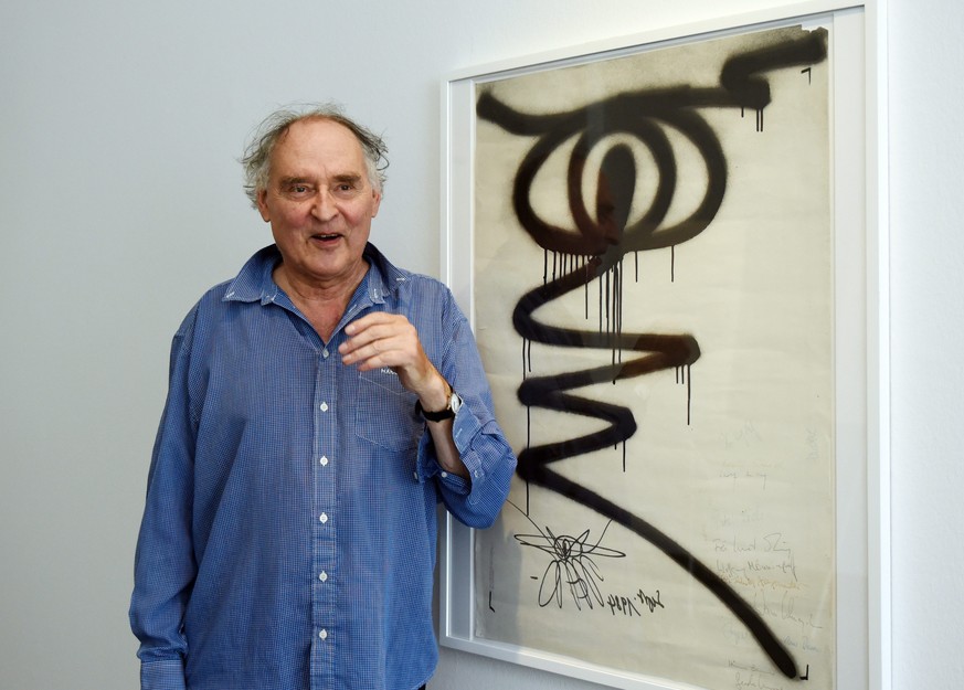 epa05508560 Swiss artist Harald Naegeli, best known as the &#039;Sprayer of Zurich&#039; in the 1970s, poses in front of his picture &#039;The Eye 1984&#039; during the press preview of his exhibition ...